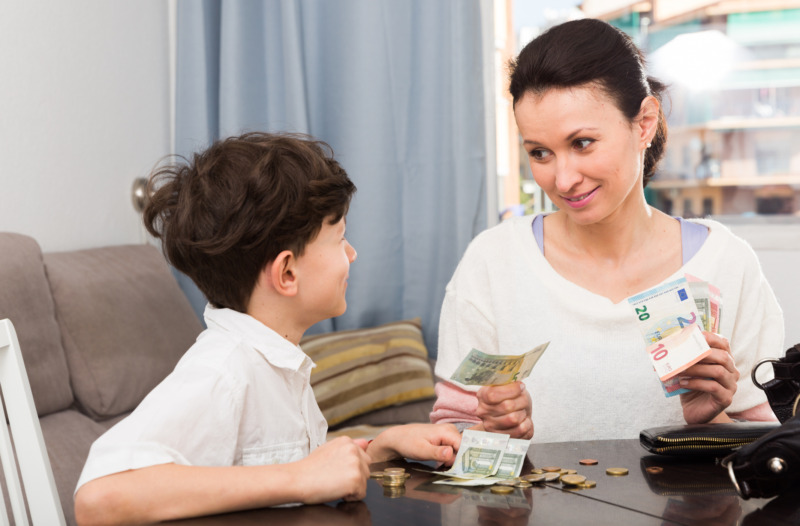 Mum gives son money